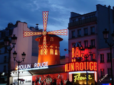 Moulin Rouge by night in Paris