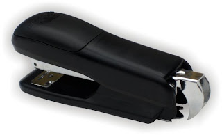 stapler with built-in staple-puller