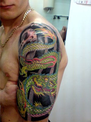 chinese dragon tattoo on arm. chinese dragon tattoo sleeve.