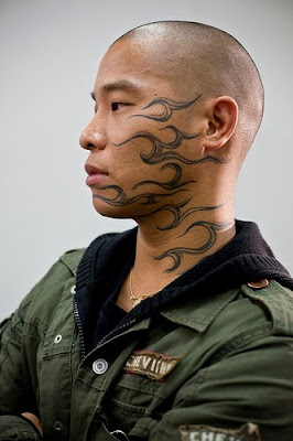 tribal designs,face tattoos