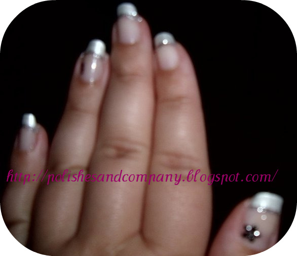 Pearly+white+French+manicure,+with+a+silver+glitter+underline.+Stickers+for+the+thumb+and+ring+finger..jpg