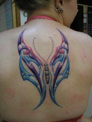 Butterfly Tattoo - Beautiful Tribal Butterfly Tattoo on Female Back