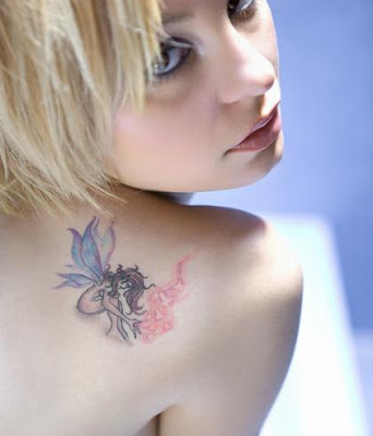 dark fairy tattoos. woman fairy tattoo