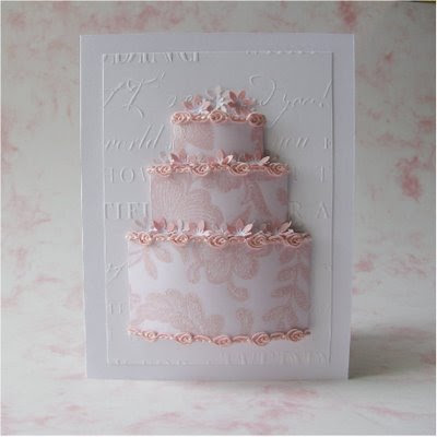 A threedimensional wedding cake adorns the front of this card