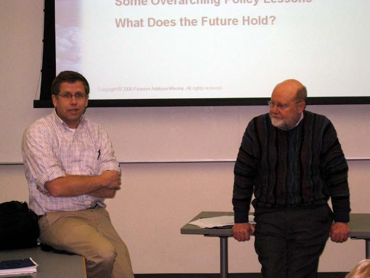 Fellow Economics Professor, Michael Donihue and Tom