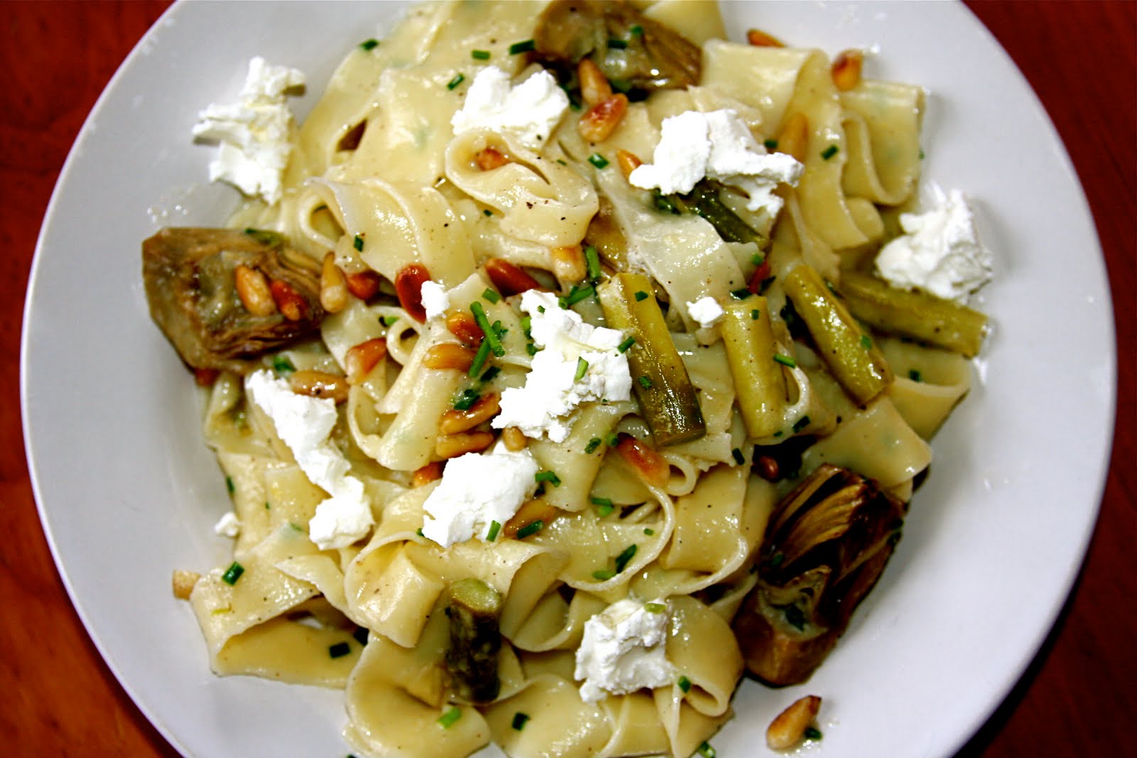 Dine Well Fresh pasta with spring artichokes, asparagus, pine nuts and