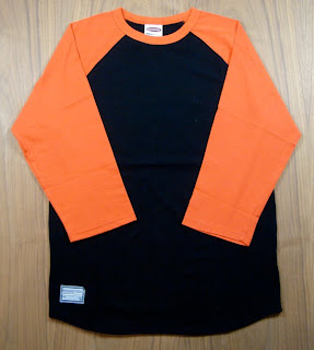 black and orange raglan shirt