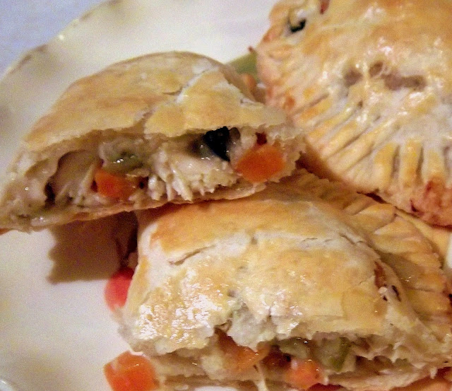 Chicken Pot Pie Pockets: Creamy chicken pot pie filling inside a tender flaky crust turned into a hand pie. The ultimate comfort food that's freezable too! - Slice of Southern