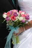 Beauty color purple, pink and white tulips with flower hand tied bouquet