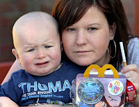 pic of young mother with unhappy child