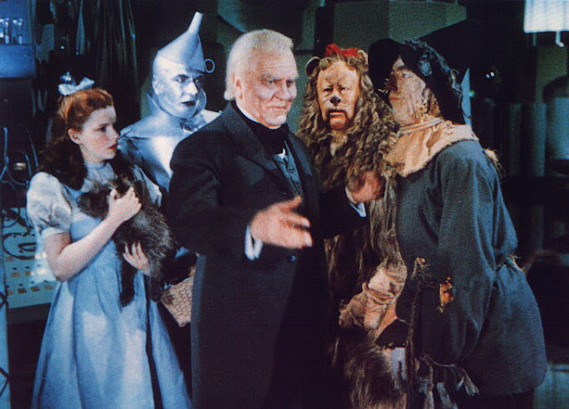Image result for wizard of oz snake oil salesman