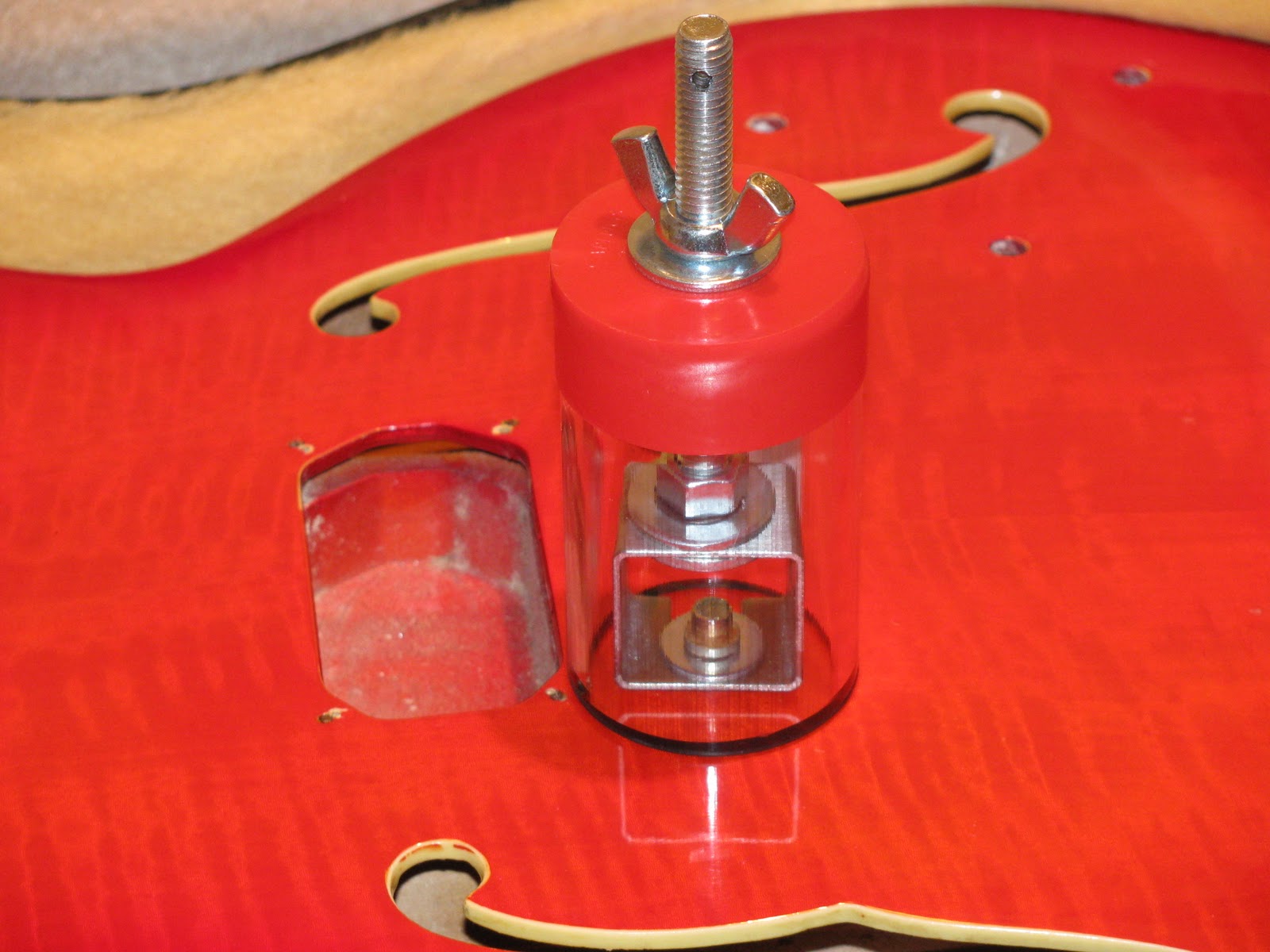 The Novice Guitar Tech Bridge studs removing