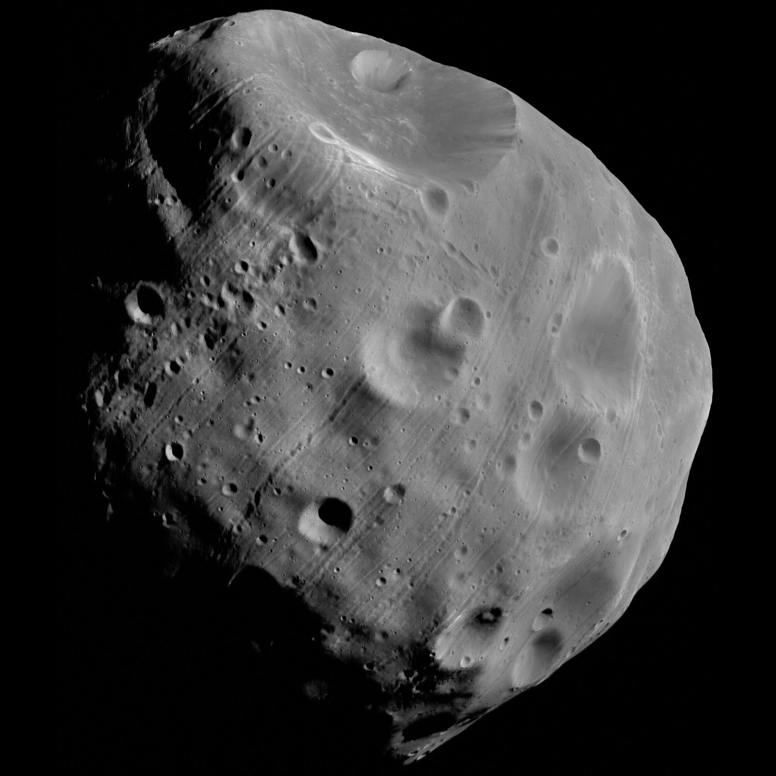 Астероиды названные в честь. Астероид Пушкин 2208. Малая Планета Пушкин 2208. Деймос кратеры. Деймос астероид.