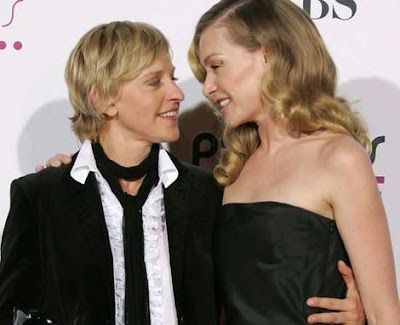 Ellen DeGeneres and Portia de Rossi mug for the camera - AP Photo