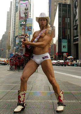 Naked Cowboy is one of many Times Square attractions competing for attention - Photo courtesy of NY Magazine