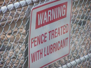 crazy funny dangerous fence sign