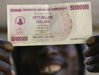 funny photo of zimbabwe currency fifty million dollars almost worthless