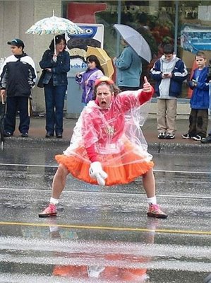 [wtf-photo-dancing-street-umbrella-man.jpg]