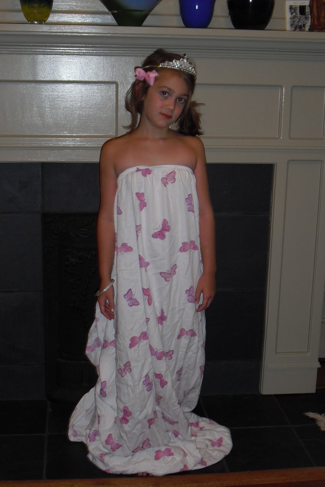 Quinn's Que Making Dresses Out of Sheets.