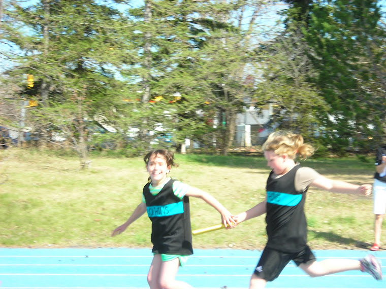 Amanda grabbing the baton