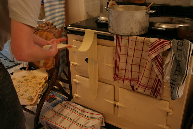 Laying out the ravioli to dry, some even on the Aga