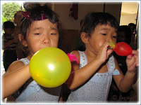 Renice and Renee, had fun blowing their balloons