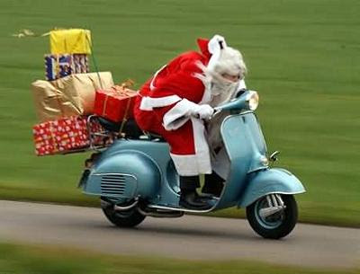 Papá noeL vespa Papá Noel va en vespa