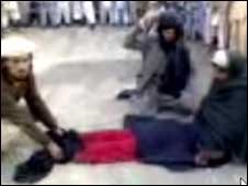 [Taliban+beating+girl.jpg]