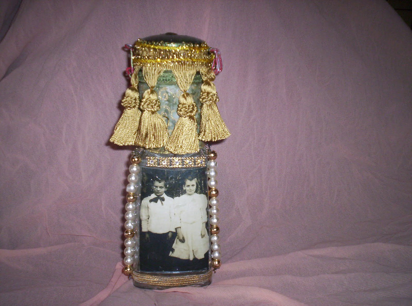 DAUGHTER OF KALI: Decorated bottle side 3