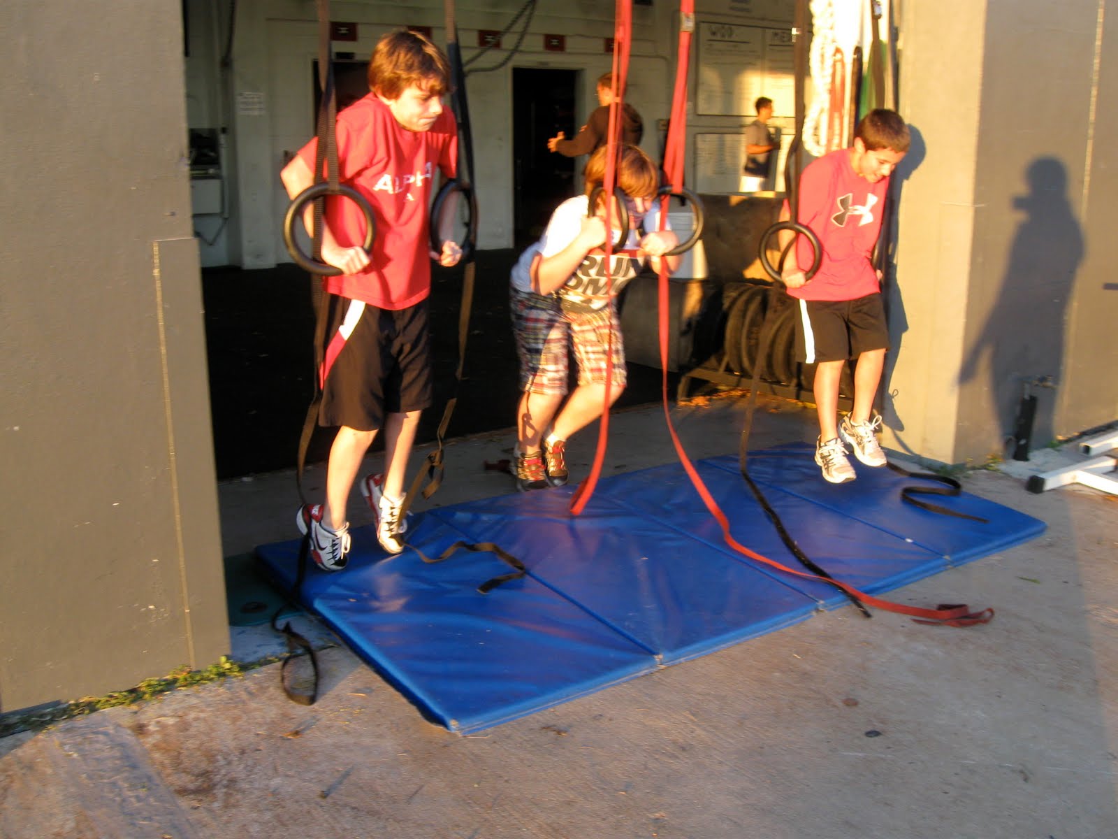 CrossFit Central Kids Muscle Ups, Med Ball Thrusters, and Musical