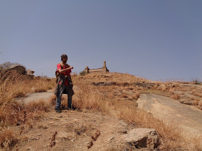 Sippy very happy after reaching the top of medigeshi. It was summer and it was scorching hot!