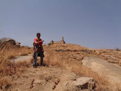 Sippy very happy after reaching the top of medigeshi. It was summer and it was scorching hot!