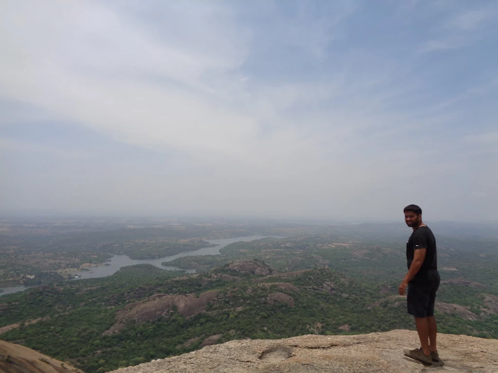 Savandurga Summit Path: A view of the steep, rocky path leading toward the peak of the monolith.
